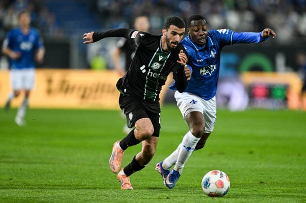 Waniss Taibi Hannover 96, 26 in duel with Merveille Papela SV Darmstadt 1898, 21 , GER, SV Darmstadt 98 vs Hannover 96, Soccer 2 Bundesliga, Matchday 29, Season 2025 2026, 11 04 2026 DFL regulations prohibit any use of photographs as image sequences and or quasi video GER, SV Darmstadt 98 vs Hannover 96, Soccer 2 Bundesliga, Matchday 29, Season 2025 2026, 11 04 2026 Darmstadt Copyright: xEibner-Pressefoto FlorianxWiegandx EP_FWD