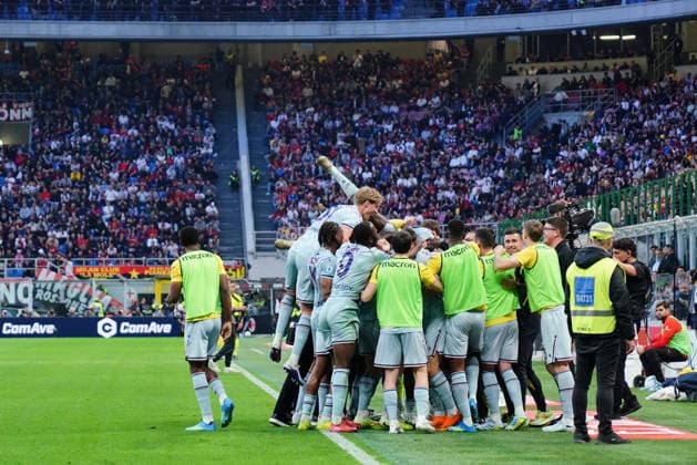 AC Milan v Udinese Calcio - Serie A The team Udinese Calcio celebrates a goal by Arthur Atta during the Italian championship Serie A football match between AC Milan and Udinese Calcio at San Siro stadium in Milan, Italy, on April 11, 2026. Milano Italy Italy  Copyright: xLucaxRossinix originalFilename:rossini-acmilanv260411_npCBg.jpg