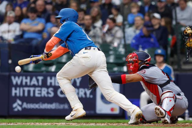 MILWAUKEE, WI - APRIL 11: Milwaukee Brewers center fielder Blake Perkins (16) drops a bunt during a game between the Milwaukee Brewers and the Washington Nationals at American Family Field on April 11, 2026, in Milwaukee, WI. (Photo by Larry Radloff Icon Sportswire) MLB, Baseball Herren, USA APR 11 Nationals at Brewers EDITORIAL USE ONLY Icon2604111080