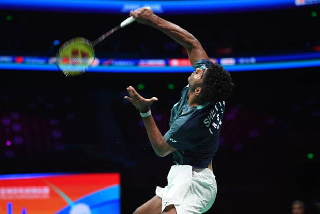 NINGBO, CHINA - APRIL 11: Ayush Shetty of India competes in the Men s Singles Semifinal match against Kunlavut Vitidsarn of Thailand on day 5 of Badminton Asia Championships 2026 at Ningbo Olympic Sports Center on April 11, 2026 in Ningbo, Zhejiang Province of China.  Copyright: xVCGx 111634120317
