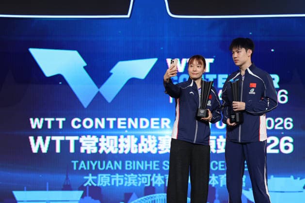 TAIYUAN, CHINA - APRIL 11: Champions Shi Xunyao and Huang Youzheng of China take a selfie after winning the Mixed Doubles Final match against Wong Chun-ting and Doo Hoi Kem of Chinese Hong Kong on day 5 of WTT Contender Taiyuan 2026 at Taiyuan Binhe Sports Center on April 11, 2026 in Taiyuan, Shanxi Province of China.  Copyright: xVCGx 111634149883