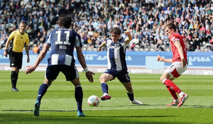 Fabian Reese, Maurice Krattenmacher on the ball, Fabian Kunze duel Match scene Action Sport Soccer Football DFL 2 Bundesliga Men 29 Matchday Season 2025 2026 11 04 2026 Hertha BSC Berlin vs 1 FC Kaiserslautern FCK DFL regulations prohibit any use of photographs as image sequences and or quasi video