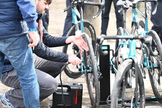 Paris - Roubaix Hauts-de-France 2026 Cycling Race ROUBAIX, FRANCE - APRIL 12 : Bike of of XDS Astana Team filling air in tires before the start of the race during the 123rd edition of Paris - Roubaix Hauts-de-France an UCI World Tour 1.UWT one day cycling road race for Men Elite of 258 km with start in Compiegne and finish in Roubaix on April 12, 2026 in Roubaix, France, 12 04 2026 ( Motordriver Kenny Verfaillie - Roubaix France  Copyright: xVincentxKalutx