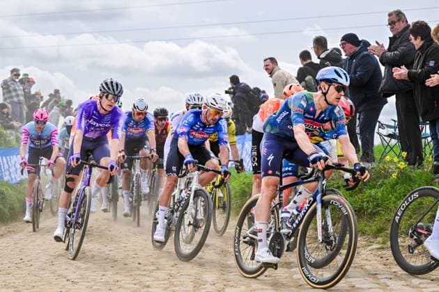 Belgian Yves Lampaert of Soudal Quick-Step and Belgian Edward Planckaert of Alpecin-Premier Tech pictured in action during the men s Paris-Roubaix cycling race, Sunday 12 April 2026, around Roubaix, France. The 123rd edition of Paris-Roubaix cycling races will take on Sunday, with the women riding 143,1 km the men riding 258,3 km on Sunday. DIRKxWAEM  x170549780x