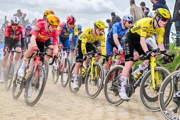 Italian Edoardo Affini of Team Visma-Lease a Bike and British James Matthew Brennan of Team Visma-Lease a Bike pictured in action during the men s Paris-Roubaix cycling race, Sunday 12 April 2026, around Roubaix, France. The 123rd edition of Paris-Roubaix cycling races will take on Sunday, with the women riding 143,1 km the men riding 258,3 km on Sunday. DIRKxWAEM  x170551303x