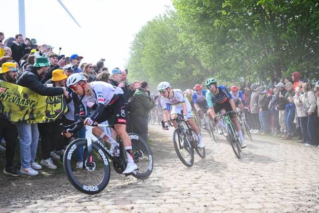 Paris - Roubaix Hauts-de-France 2026 Cycling Race ROUBAIX, FRANCE - APRIL 12 : Vermeersch Florian (BEL) of UAE Team Emirates XRG, Pogacar Tadej (SLO) of UAE Team Emirates XRG in action during the 123rd edition of Paris - Roubaix Hauts-de-France an UCI World Tour 1.UWT one day cycling road race for Men Elite of 258 km with start in Compiegne and finish in Roubaix on April 12, 2026 in Roubaix, France, 12 04 2026 ( Motordriver Kenny Verfaillie - Roubaix France  Copyright: xVincentxKalutx