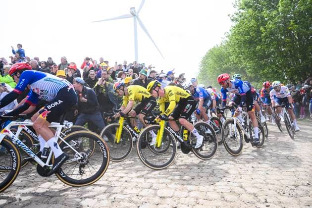 Paris - Roubaix Hauts-de-France 2026 Cycling Race ROUBAIX, FRANCE - APRIL 12 : Brennan Matthew (GBR) of Team Visma Lease a Bike, Van Aert Wout (BEL) of Team Visma Lease a Bike in action during the 123rd edition of Paris - Roubaix Hauts-de-France an UCI World Tour 1.UWT one day cycling road race for Men Elite of 258 km with start in Compiegne and finish in Roubaix on April 12, 2026 in Roubaix, France, 12 04 2026 ( Motordriver Kenny Verfaillie - Roubaix France  Copyright: xVincentxKalutx