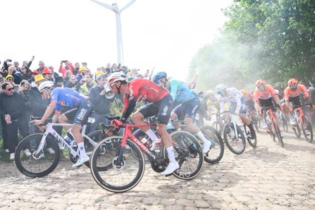Paris - Roubaix Hauts-de-France 2026 Cycling Race ROUBAIX, FRANCE - APRIL 12 : Dillier Silvan (SUI) of Alpecin-Premier Tech, Giddings Joshua (GBR) of Lotto Intermarche in action during the 123rd edition of Paris - Roubaix Hauts-de-France an UCI World Tour 1.UWT one day cycling road race for Men Elite of 258 km with start in Compiegne and finish in Roubaix on April 12, 2026 in Roubaix, France, 12 04 2026 ( Motordriver Kenny Verfaillie - Roubaix France  Copyright: xVincentxKalutx