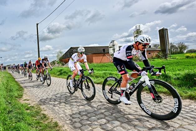 Slovenian Tadej Pogacar of UAE Team Emirates-XRG and Portuguese Antonio Morgado of UAE Team Emirates-XRG pictured in action during the men s Paris-Roubaix cycling race, Sunday 12 April 2026, around Roubaix, France. The 123rd edition of Paris-Roubaix cycling races will take on Sunday, with the women riding 143,1 km the men riding 258,3 km on Sunday. DIRKxWAEM  x170552001x