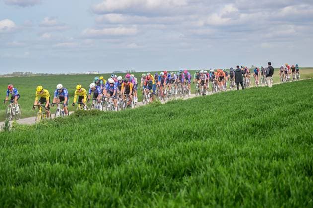 The pack of riders pictured in action during the men s Paris-Roubaix cycling race, Sunday 12 April 2026, around Roubaix, France. The 123rd edition of Paris-Roubaix cycling races will take on Sunday, with the women riding 143,1 km the men riding 258,3 km on Sunday. DIRKxWAEM  x170553200x