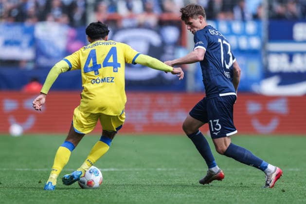 Soccer 2 Bundesliga 29 Matchday VfL Bochum Eintracht Braunschweig on 12 04 2026 at Vonovia Ruhrstadion in Bochum Johan Gomez Braunschweig , left Oliver Olsen Bochum , right DFL regulations prohibit any use of photographs as image sequences and or quasi video xJRx