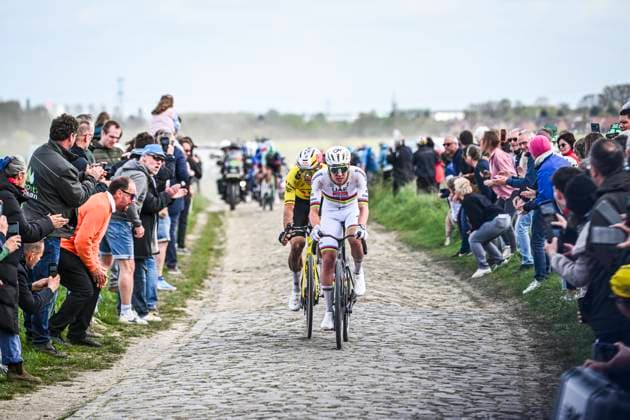 Paris - Roubaix Hauts-de-France 2026 Cycling Race ROUBAIX, FRANCE - APRIL 12 : Pogacar Tadej (SLO) of UAE Team Emirates XRG, Van Aert Wout (BEL) of Team Visma Lease a Bike in the escape pack during the 123rd edition of Paris - Roubaix Hauts-de-France an UCI World Tour 1.UWT one day cycling road race for Men Elite of 258 km with start in Compiegne and finish in Roubaix on April 12, 2026 in Roubaix, France, 12 04 2026 ( Motordriver Kenny Verfaillie - Roubaix France  Copyright: xVincentxKalutx