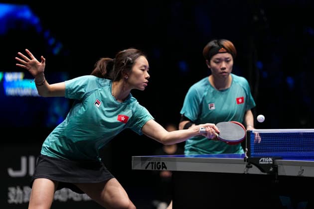 (260412) -- TAIYUAN, April 12, 2026 -- Doo Hoi Kem Ng Wing Lam (L) of China s Hong Kong compete during the women s doubles final match against Shi Xunyao Han Feier of China at the World Table tennis, Tischtennis (WTT) Contender Taiyuan 2026 in Taiyuan, north China s Shanxi Province, April 12, 2026. ) (SP)CHINA-TAIYUAN-TABLE TENNIS-WTT CONTENDER TAIYUAN 2026-FINALS (CN) YangxChenguang 