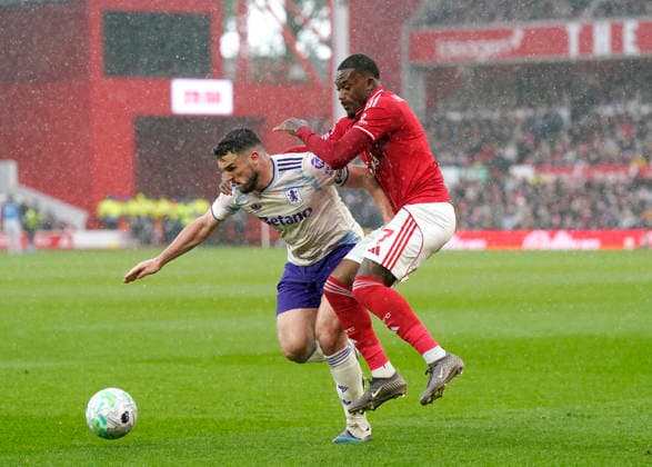 Nottingham, England, 12th April 2026. John McGinn of Aston Villa (l) tussles with Callum Hudson-Odoi of Nottingham Forest (r) during the Nottingham Forest vs Aston Villa Premier League match at the City Ground, Nottingham. Picture credit should read: Andrew Yates Sportimage EDITORIAL USE ONLY. No use with unauthorised audio, video, data, fixture lists, club league logos or live services. Online in-match use limited to 120 images, no video emulation. No use in betting, games or single club league player publications. SPI_026_AY_Forest_Villa SPI-4682-0026