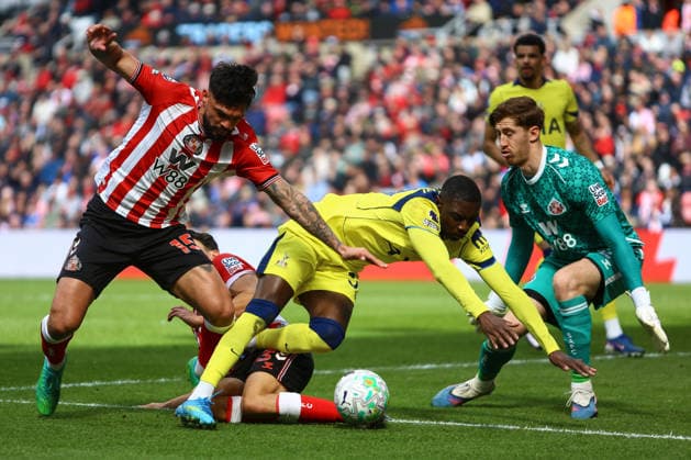 SUNDERLAND, ENGLAND, APRIL 12: Omar Alderete (L) and Luke O Nien (M) of Sunderland AFC tackle Randal Kolo Muani (R) of Tottenham Hotspur during a Premier League 2025-26 match between Sunderland and Tottenham Hotspur at Stadium of Light on April 12, 2026 in Sunderland, England. (Photo by Zach Forster Sports Press Photo) Copyright: xZachxForster SportsxPressxPhotox Sportspressphoto_SPR128038