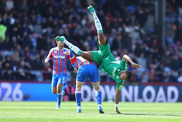 Malick Thiaw of Newcastle United tumbles over Jorgen Strand Larsen of Crystal Palace Crystal Palace v Newcastle United, Premier League, Football, Selhurst Park, London, UK - 12 Apr 2026London Selhurst Park United Kingdom EDITORIAL USE ONLY No use with unauthorised audio, video, data, fixture lists, club league logos or live services. Online in-match use limited to 120 images, no video emulation. No use in betting, games or single club league player publications. Copyright: xMichaelxZemanek Shutterstockx 16823618q