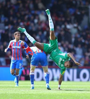 Malick Thiaw of Newcastle United tumbles over Jorgen Strand Larsen of Crystal Palace Crystal Palace v Newcastle United, Premier League, Football, Selhurst Park, London, UK - 12 Apr 2026London Selhurst Park United Kingdom EDITORIAL USE ONLY No use with unauthorised audio, video, data, fixture lists, club league logos or live services. Online in-match use limited to 120 images, no video emulation. No use in betting, games or single club league player publications. Copyright: xMichaelxZemanek Shutterstockx 16823618r