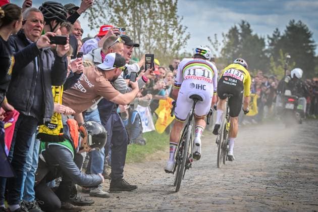Slovenian Tadej Pogacar of UAE Team Emirates-XRG and Belgian Wout van Aert of Team Visma-Lease a Bike pictured in action during the men s Paris-Roubaix cycling race, Sunday 12 April 2026, around Roubaix, France. The 123rd edition of Paris-Roubaix cycling races will take on Sunday, with the women riding 143,1 km the men riding 258,3 km on Sunday. DIRKxWAEM  x170563598x