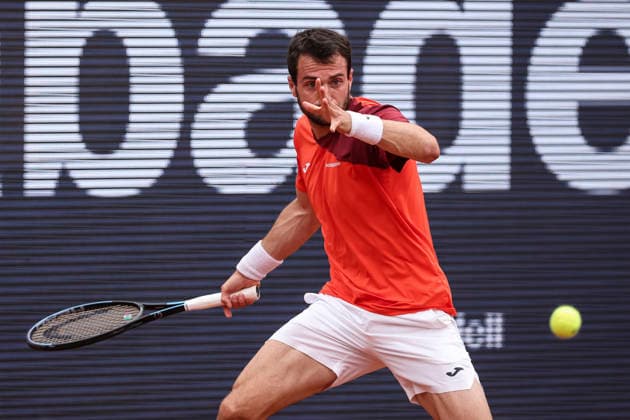 April 12, 2026, Barcelona, Barcelona, Spain: Pedro Martinez of Spain in action agaisnt Marco Trungellitt of Argentina in Qualifying match during the second day of the Barcelona Open Banc Sabadell 2026 at Real Club de Tenis Barcelona on April 12, 2026 in Barcelona, Spain. Barcelona Open Banc Sabadell - Conde Godo 2026 Day 2  - ZUMAa181 20260412_zaa_a181_293 Copyright: xJavierxBorregox
