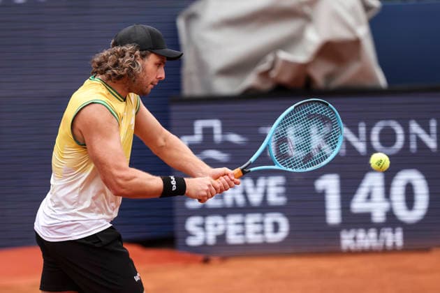 April 12, 2026, Barcelona, Barcelona, Spain: Marco Trungellitti of Argentina in action agaisnt Pedro Martinez of Spain in Qualifying match during the second day of the Barcelona Open Banc Sabadell 2026 at Real Club de Tenis Barcelona on April 12, 2026 in Barcelona, Spain. Barcelona Spain - ZUMAa181 20260412_zaa_a181_297 Copyright: xJavierxBorregox