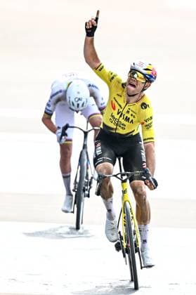Belgian Wout van Aert of Team Visma-Lease a Bike celebrates as he crosses the finish line to win the men s Paris-Roubaix cycling race, Sunday 12 April 2026, around Roubaix, France. The 123rd edition of Paris-Roubaix cycling races will take on Sunday, with the women riding 143,1 km the men riding 258,3 km on Sunday. JASPERxJACOBS  x170566982x