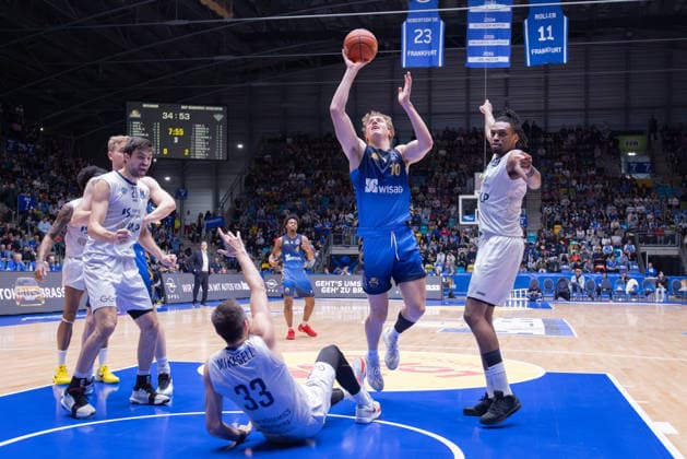 Frankfurt Skyliners MLP Academics Heidelberg, easyCredit BBL offensive foul by Jacob Holt Skyliners, 10 on Ryan Mikesell MLP Academics Heidelberg, 33 Game of the easyCredit BBL between Frankfurt Skyliners and MLP Academics Heidelberg on April 12, 2026 at Süwag Energie ARENA in Frankfurt am Main , Frankfurt am Main Hessen Germany Süwag Energie ARENA