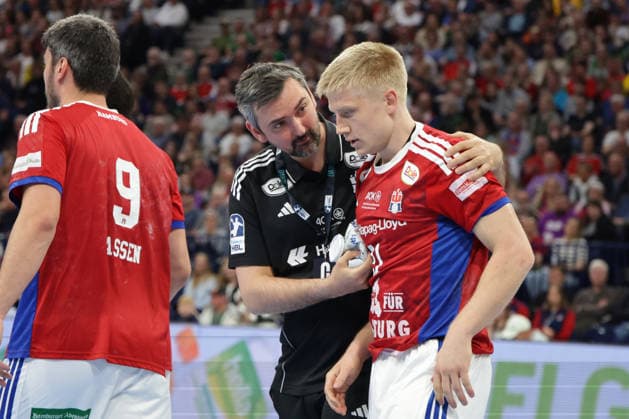 2026 04 12 xfsx Daikin HBL Handballl 1 Bundesliga Hamburger Sportverein Handball THW Kiel v l Frederik Bo Andersen 21, HSV Hamburg Handball is injured Copyright: HMBxMedia FernandoxSoares