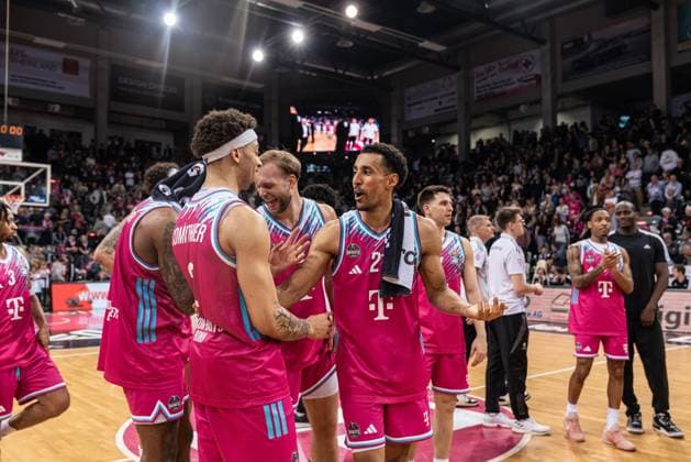 Joel Aminu 21 Telekom Baskets Bonn , Melvin Jostmann 12 Telekom Baskets Bonn , Grayson Murphy 7 Telekom Baskets Bonn , Tylan Birts 5 Telekom Baskets Bonn and Jalen Finch 0 Telekom Baskets Bonn interact on the court in the TelekomDome EasyCredit BBL league game on matchday 29 in Bonn between Telekom Baskets Bonn and Basketball Löwen Braunschweig Interaction of Joel Aminu 21 Telekom Baskets Bonn and teammates Copyright: xFeyzullahxGökalp feyzofsportsx