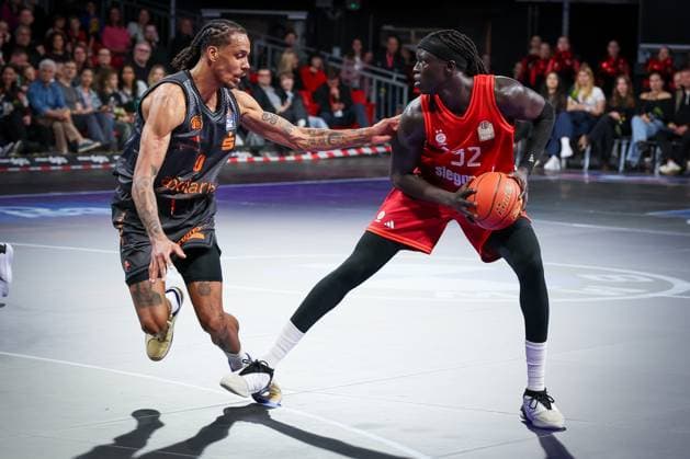 left to right Kevin Yebo 0 Niners Chemnitz vs Wenyen Gabriel 32 FC Bayern Muenchen Basketball , FC Bayern Muenchen Basketball vs Niners Chemnitz, easyCredit BBL, Basketball, Bundesliga, Men, Main Round, April 12, 2026 Muenchen Bayern Germany Copyright: xkolbert-press MartinxAgüerax