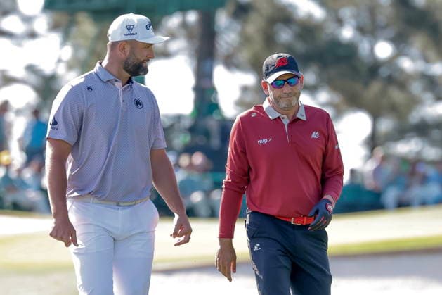 Golf - Masters Tournament round 4 Jon Rahm (L) and Sergio Garcia (R) of Spain walk off the tee on the third hole during the final round of the 2026 Masters Tournament at the Augusta National Golf Club in Augusta, Georgia, USA, 12 April 2026. AUGUSTA GEORGIA United States  Copyright: xERIKxS.xLESSERx