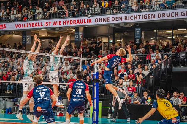 Volleyball Mens Bundesliga Playoffs Semifinals 2025 2026 SVG Lüneburg vs SWD powervolleys Düren 12 04 2026 Axel Enlund 17 SVG Lüneburg against the block of Siebe Korenblek 12 SWD powervolleys Düren and Sjors Tijhuis 5 SWD powervolleys Düren