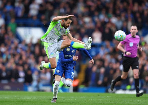 12th April 2026; Stamford Bridge, Chelsea, London, England: Premier League Football, Chelsea versus Manchester City; Bernardo Silva of Manchester City under pressure from Cole Palmer of Chelsea JPxFletcher