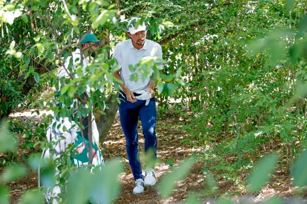 Golf - Masters Tournament round 4 Marco Penge of England approaches his ball in the bushes off the fairway of the second hole during the final round of the 2026 Masters Tournament at the Augusta National Golf Club in Augusta, Georgia, USA, 12 April 2026. AUGUSTA GEORGIA United States  Copyright: xERIKxS.xLESSERx