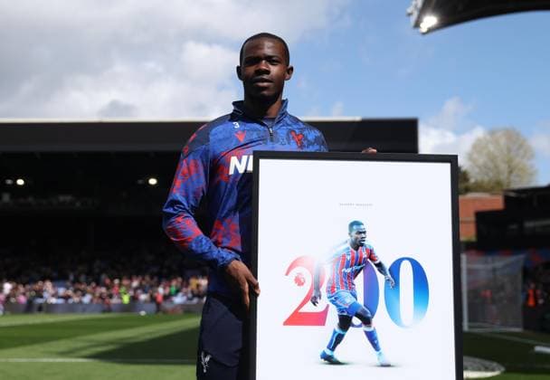 LONDON, ENGLAND, APRIL 12: Tyrick Mitchell of Crystal Palace is presented an awarded to commemorate 200 appearances for Crystal Palace ahead of the Premier League match between Crystal Palace FC v Newcastle United FC at Selhurst Park Stadium, London, England, on April 12. (Photo by Daniel Weir) Copyright: xDanielxWeir SportsxPressxPhotox Sportspressphoto_SPR128350