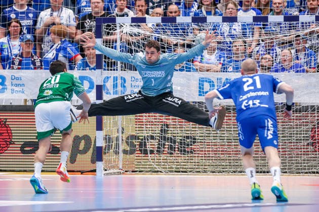 2026 04 12, xkwix, Handball, HBL, TBV Lemgo Lippe Füchse Berlin, PHOENIX CONTACT arena, 28 Matchday, Season 2025 2026 Constantin Möstl TBV Lemgo Lippe 1 jumps into the air while throwing against Tim Freihöfer Füchse Berlin 20 DFB regulations prohibit any use of photographs as image sequences and or quasi video Photo xKamilxWilkowskixPressefotoKochx Nordrhein Westfalen Germany