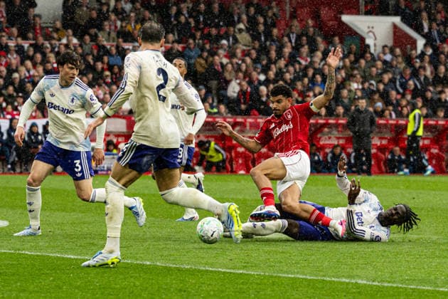 12th April 2026; The City Ground, Nottingham, England; Premier League Football, Nottingham Forest versus Aston Villa; Morgan Gibbs-White of Nottingham Forest is brought down by Amadou Onana of Aston Villa GodfreyxPitt