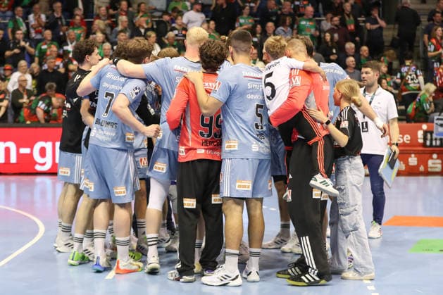 12 04 2026, xgox, Handball Daikin HBL SC Magdeburg HC Erlangen emspor, v l Erlangen disappointed, looks disappointed, disappointed Magdeburg