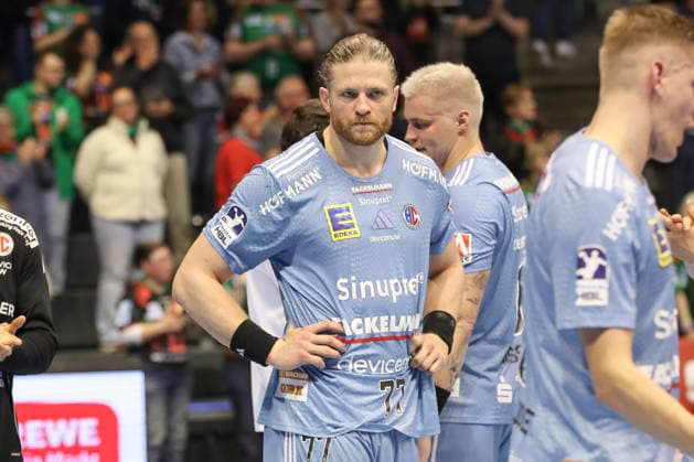 12 04 2026, xgox, Handball Daikin HBL SC Magdeburg HC Erlangen emspor, v l Maciej Gebala Erlangen, 77 disappointed, looks disappointed, disappointed Magdeburg
