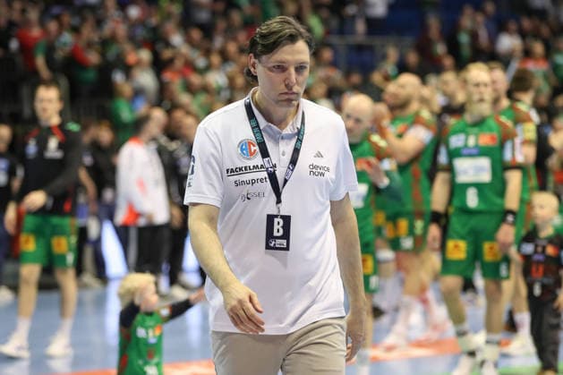 12 04 2026, xgox, Handball Daikin HBL SC Magdeburg HC Erlangen emspor, v l Johannes Sellin Erlangen, coach disappointed, looks disappointed, disappointed Magdeburg