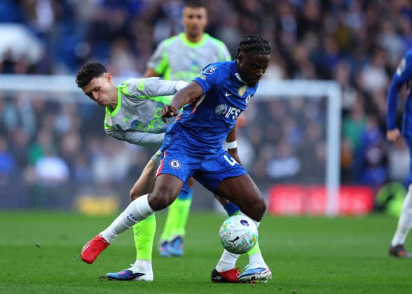 12th April 2026; Stamford Bridge, Chelsea, London, England: Premier League Football, Chelsea versus Manchester City; Romeo Lavia of Chelsea under pressure from Phil Foden of Manchester City JPxFletcher