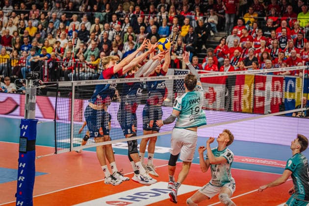 Volleyball Mens Bundesliga Playoffs Semifinals 2025 2026 SVG Lüneburg vs SWD powervolleys Düren 12 04 2026 Ryan Poole 19 SWD powervolleys Düren against the block of Axel Enlund 17 SVG Lüneburg , Jackson Howe 6 SVG Lüneburg and Daniel Gruvaeus 2 SVG Lüneburg