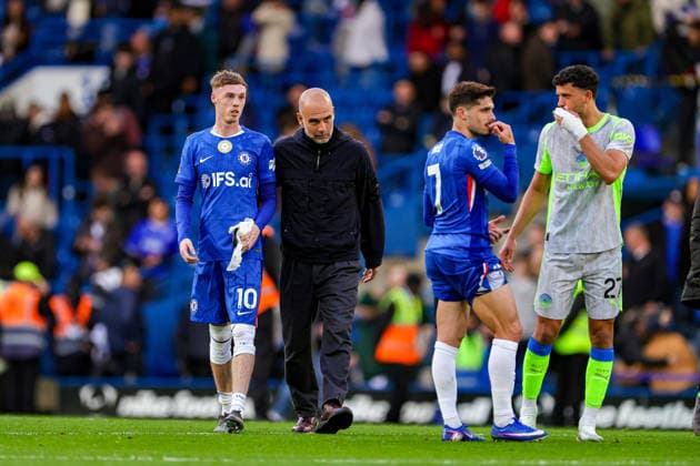 Chelsea v Manchester City, Premier League Pep Guardiola Manager of Manchester City with Cole Palmer (10) of Chelsea at full time during the Premier League match between Chelsea and Manchester City at Stamford Bridge, London, UK on 12 April 2026. Editorial use only DataCo restrictions apply See www.football-dataco.com , Copyright: xNigelxKeenex PSI-24056-0087