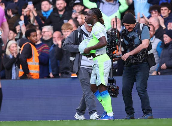 London, England, 12th April 2026. Jeremy Doku of Manchester City celebrates after scoring to make it 3-0 during the Chelsea vs Manchester City Premier League match at Stamford Bridge, London. Picture credit should read: Paul Terry Sportimage EDITORIAL USE ONLY. No use with unauthorised audio, video, data, fixture lists, club league logos or live services. Online in-match use limited to 120 images, no video emulation. No use in betting, games or single club league player publications. SPI_045_PT_Chelsea_Man_City SPI-4683-0045