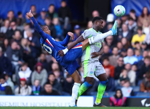 London, England, 12th April 2026. Joao Pedro of Chelsea and Marc Guehi of Manchester City challenge for the ball during the Chelsea vs Manchester City Premier League match at Stamford Bridge, London. Picture credit should read: Paul Terry Sportimage EDITORIAL USE ONLY. No use with unauthorised audio, video, data, fixture lists, club league logos or live services. Online in-match use limited to 120 images, no video emulation. No use in betting, games or single club league player publications. SPI_047_PT_Chelsea_Man_City SPI-4683-0047