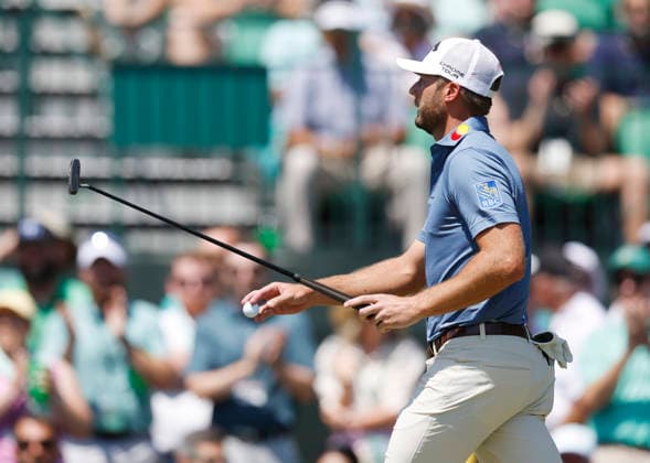 Sam Burns reacts after a birdie putt on the 1st hole during the final round of the Masters Tournament at Augusta National Golf Club on Sunday, April 12, 2026, in Augusta, Georgia.  AUG20260412812 JOHNxANGELILLO