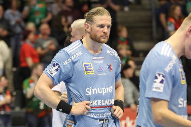 12 04 2026, xgox, Handball Daikin HBL SC Magdeburg HC Erlangen emspor, v l Maciej Gebala Erlangen, 77 disappointed, looks disappointed, disappointed Magdeburg