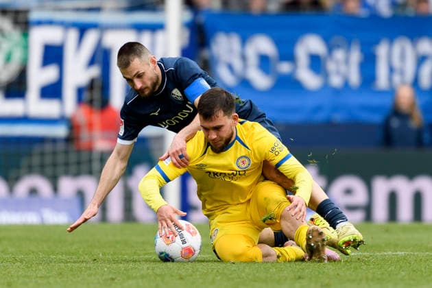 Mehmet Aydin Eintracht Braunschweig and Matus Bero VfL Bochum battle for the ball during the 2 Bundesliga match between VfL Bochum and Eintracht Braunschweig, Vonovia Ruhrstadion on April 12, 2026 in Bochum, Germany, Germany Photo by Max Maiwald DeFodi Images Mehmet Aydin Eintracht Braunschweig and Matus Bero VfL Bochum battle for the ball during the 2 Bundesliga match between VfL Bochum and Eintracht Braunschweig at Vonovia Ruhrstadion on April 12, 2026 in Bochum, Germany Photo by Max Maiwald DeFodi Images Photo by Max Maiwald DeFodi Images