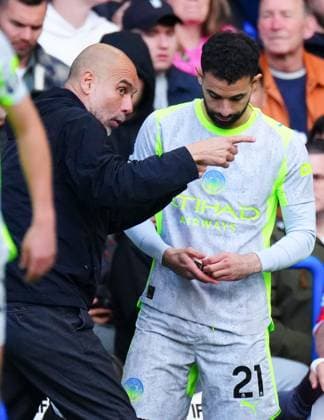 Manchester City Manager Pep Guardiola issues instructions to Rayan Aït-Nouri Chelsea v Manchester City, Premier League, Football, Stamford Bridge, London, UK - 12 Apr 2026London Stamford Bridge United Kingdom EDITORIAL USE ONLY No use with unauthorised audio, video, data, fixture lists, club league logos or live services. Online in-match use limited to 120 images, no video emulation. No use in betting, games or single club league player publications. Copyright: xJavierxGarcia Shutterstockx 16823620cd