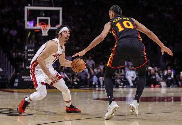 NBA, Basketball Herren, USA Miami Heat vs Atlanta Hawks game Miami Heat Forward Jaime Jaquez Jr (L) in action against Atlanta Hawks Forward Zaccharie Risacher during the NBA basketball game between the Miami Heat and the Atlanta Hawks at the Kaseya Center in Miami, Florida, USA, 12 April 2026. MIAMI FLORIDA United States  Copyright: xCRISTOBALxHERRERA-ULASHKEVICHx