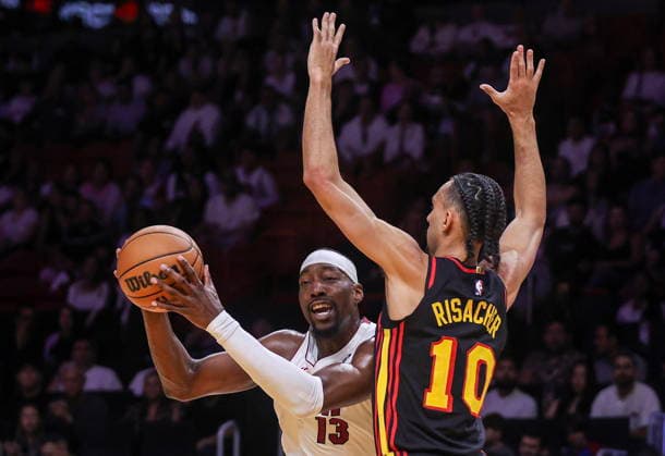 NBA, Basketball Herren, USA Miami Heat vs Atlanta Hawks game Miami Heat Center Forward Bam Adebayo (L) in action against Atlanta Hawks Forward Zaccharie Risacher during the NBA basketball game between the Miami Heat and the Atlanta Hawks at the Kaseya Center in Miami, Florida, USA, 12 April 2026. MIAMI FLORIDA United States  Copyright: xCRISTOBALxHERRERA-ULASHKEVICHx